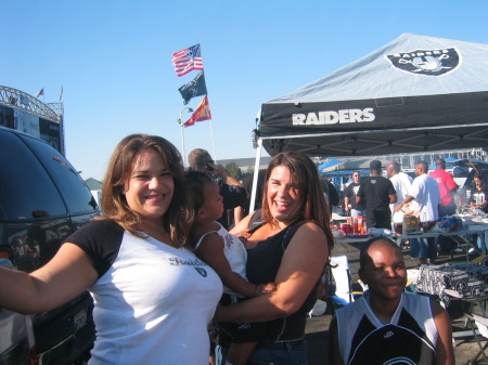 Toni's girls and son-in-law at a Raider Game