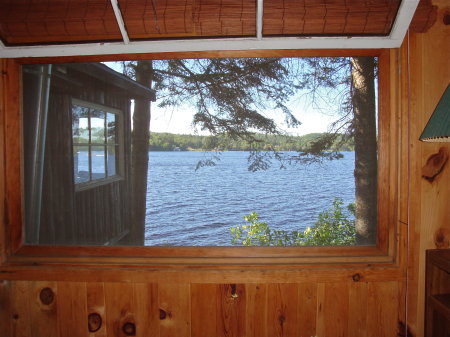 Bedroom looking into breakfast nook and to lake