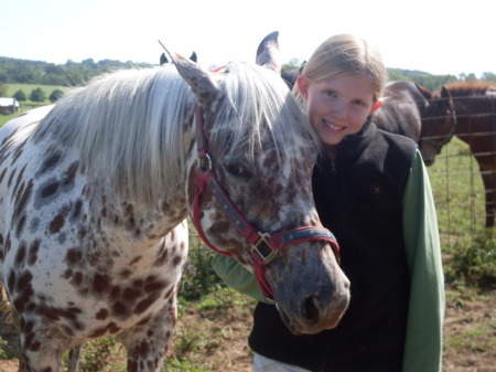 My daughter Sara and her horse Freckles