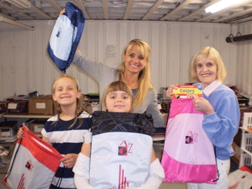 Mom, the girls and I at  "School on Wheels"