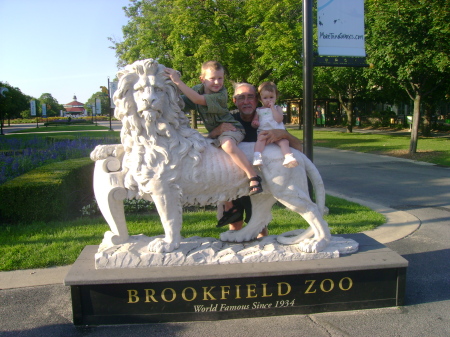 My husband Jim and two of our grandkids