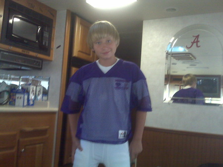 Logan getting ready for Football practice