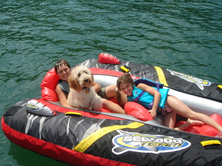 Kids tubing with our Goldendoodle, GiGi