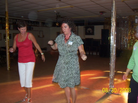 Traci teaching Lisa a new dance