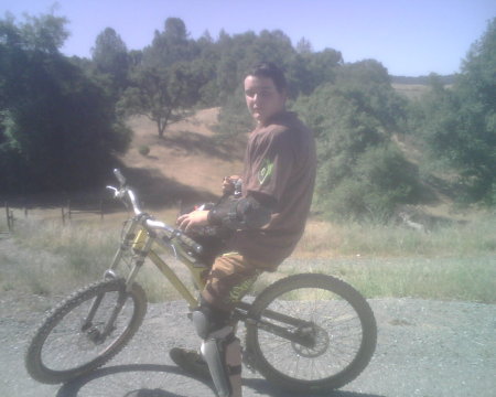 my son on my bike.....ugggg