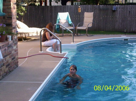 joey in backyard pool