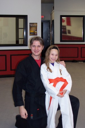 Chantal earns her Orange Belt.