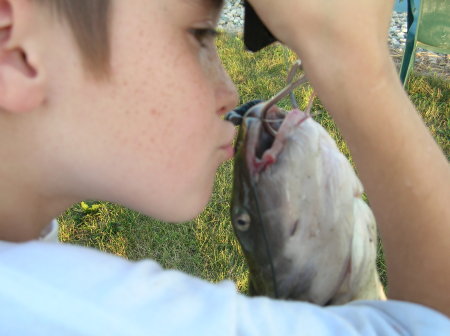 My youngest son, Ethan, with a 10 pound catfish he caught in Indiana