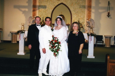 Theresa & I with my parents on my wedding day.