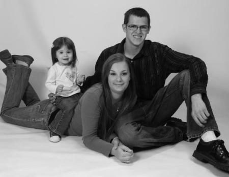 Step son Aaron and his wife and daughter.
