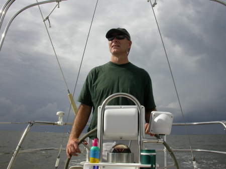 Dan at the helm of his boat while in Chesapeake Bay