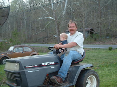 WORKING ON THE MOWER