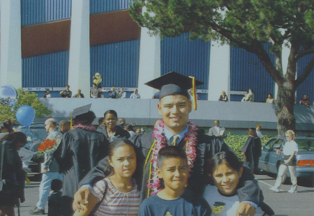 graduation pic with nieces and nephew