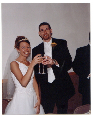 Bobby, and I during our toast at our wedding