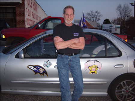 leaning against Mom's car