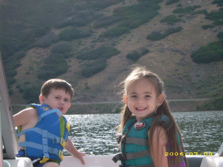 Aidan and Kinzie out boating with mom and dad
