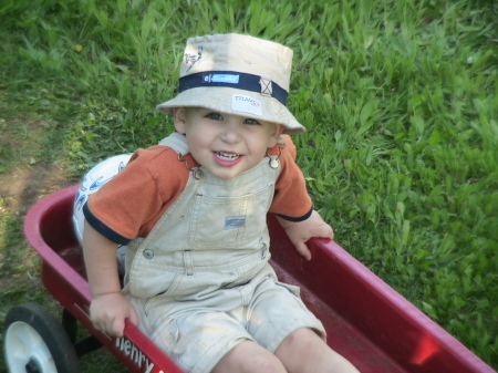 Patrick in my old red wagon