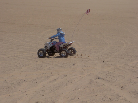 My wife riding her quad at glamis