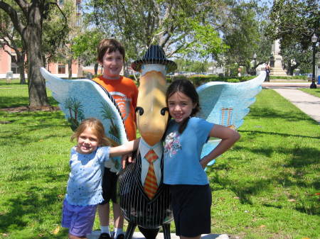 Pelican in Pensacola with grand children