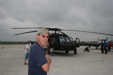 On the flight line with a UH 60 Blackhawk