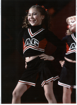 My kid, a cheerleader... Who'd a thought?!?!?
