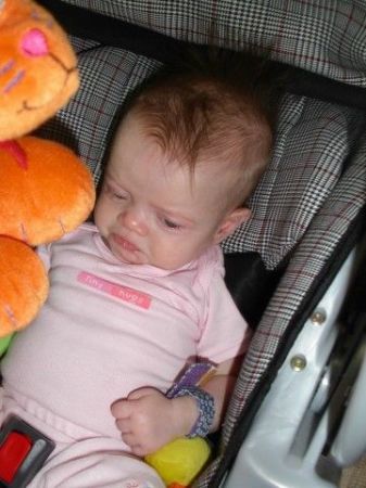 My neice Lucy pouting in her car seat.  :)