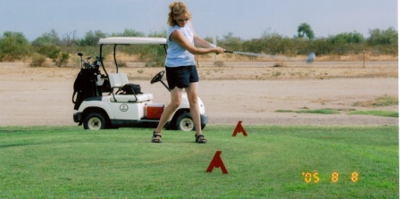 Me playing Golf... my brother, Mike,  gets angry cause I can play from the red tees (  :