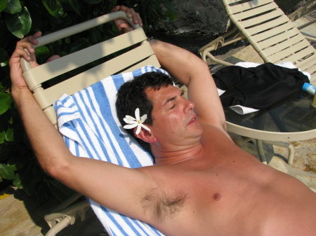 Adrian, dozing at the pool...pretty flower!LOL