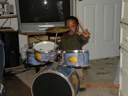 Bryce playing the drums, He just turned 3!