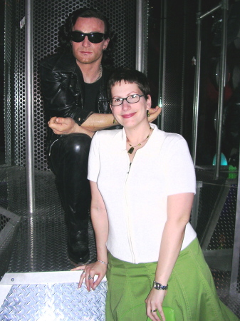 My twin sister Kelli, with Bono