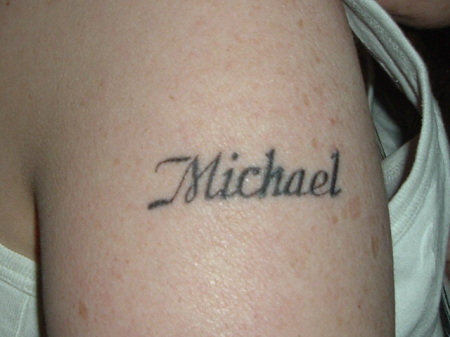 My new tattoo with my hubbys name on my arm.