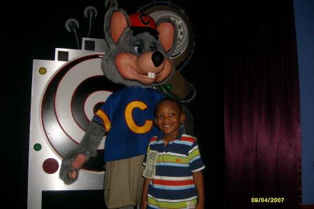 This is my son on his 5th birthday, with Chuck E. Cheese