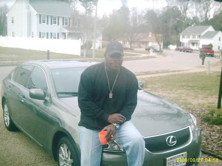 Me sitting on my wifes car