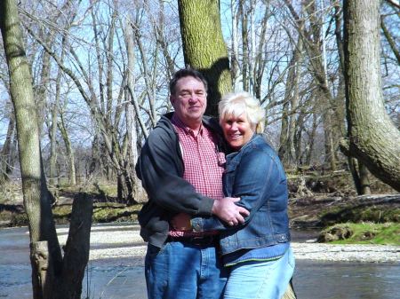 Husband Ron and me in the woods