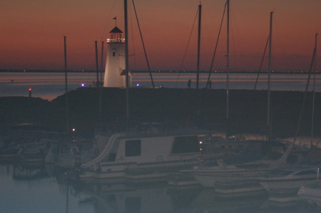 boats, lighthouse, shadows, dusk