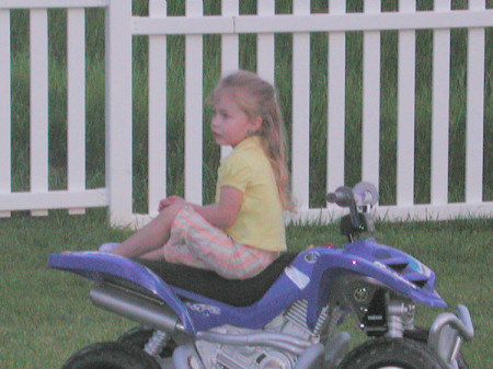 Hannah hangin out on her 4-wheeler