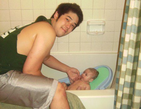Daddy giving Chloe a bath