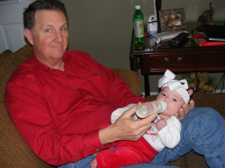 my husband with our new grandaughter 12/1/08