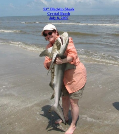 Phyllis with shark she caught at Crystal Beach