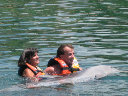 Betsy and Mark with dolphin