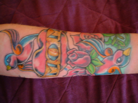 Left arm tattoo