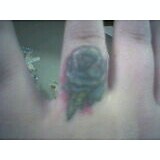 Left Ring Finger Tattoo