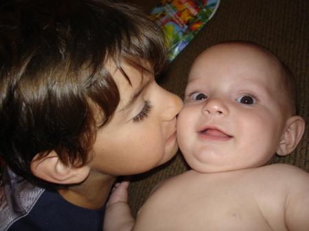 Kisses for his sister