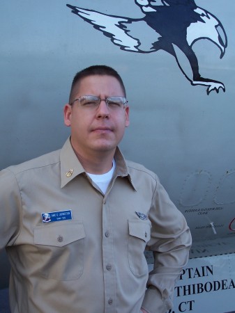 Me on the ship by an E-2C Hawkeye airraft