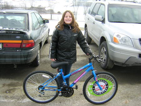 my daughter Haleigh after winning bike at work Xmas party