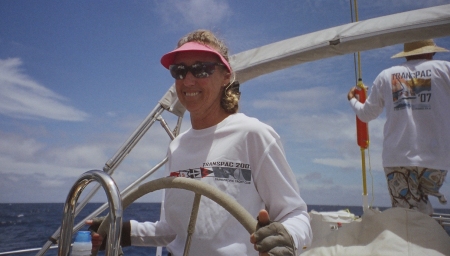 Kathy at the helm of Traveler during Transpac Race 2007