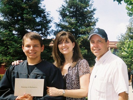 My eldest son, wife Ronda and me at Mike's 8th grade grad. "07