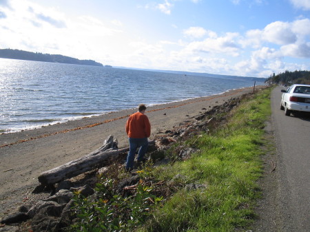 my son walking the beach outside our house, Purdy Spit