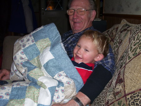 Tyler snuggling with Great Grandpa 11/19/08