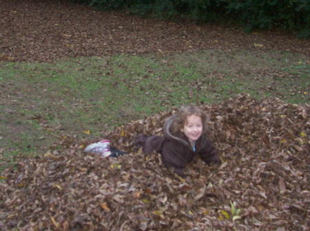 Eirene playing in the leaves